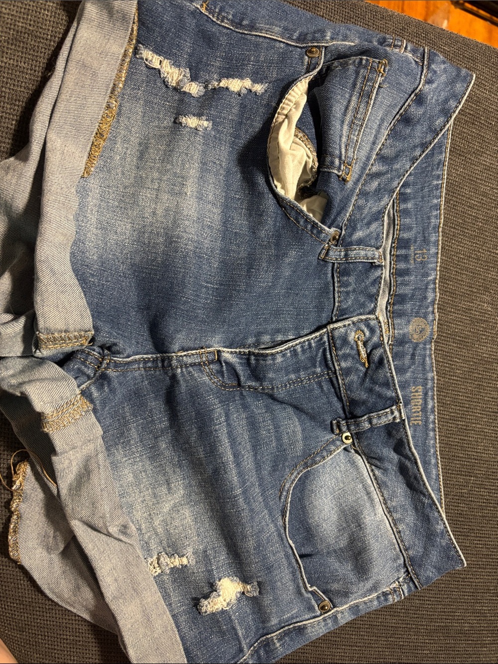 SO Women’s Distressed Denim Shorts in Blue Wash
